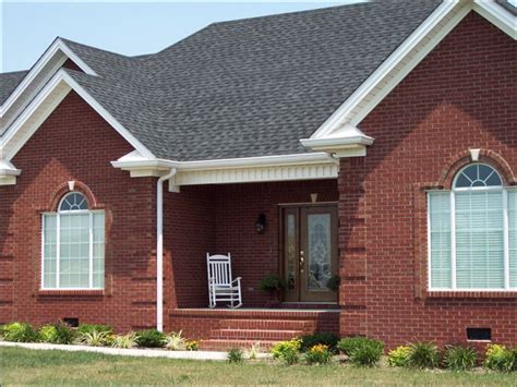 charcoal gray metal roof on red brick house|red brick roof colors.